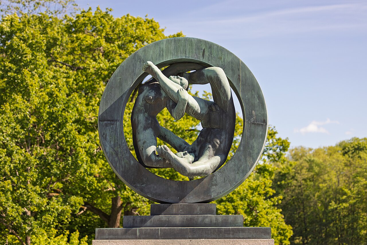 Vigeland Park sculpture — two figures intertwined inside a granite ring